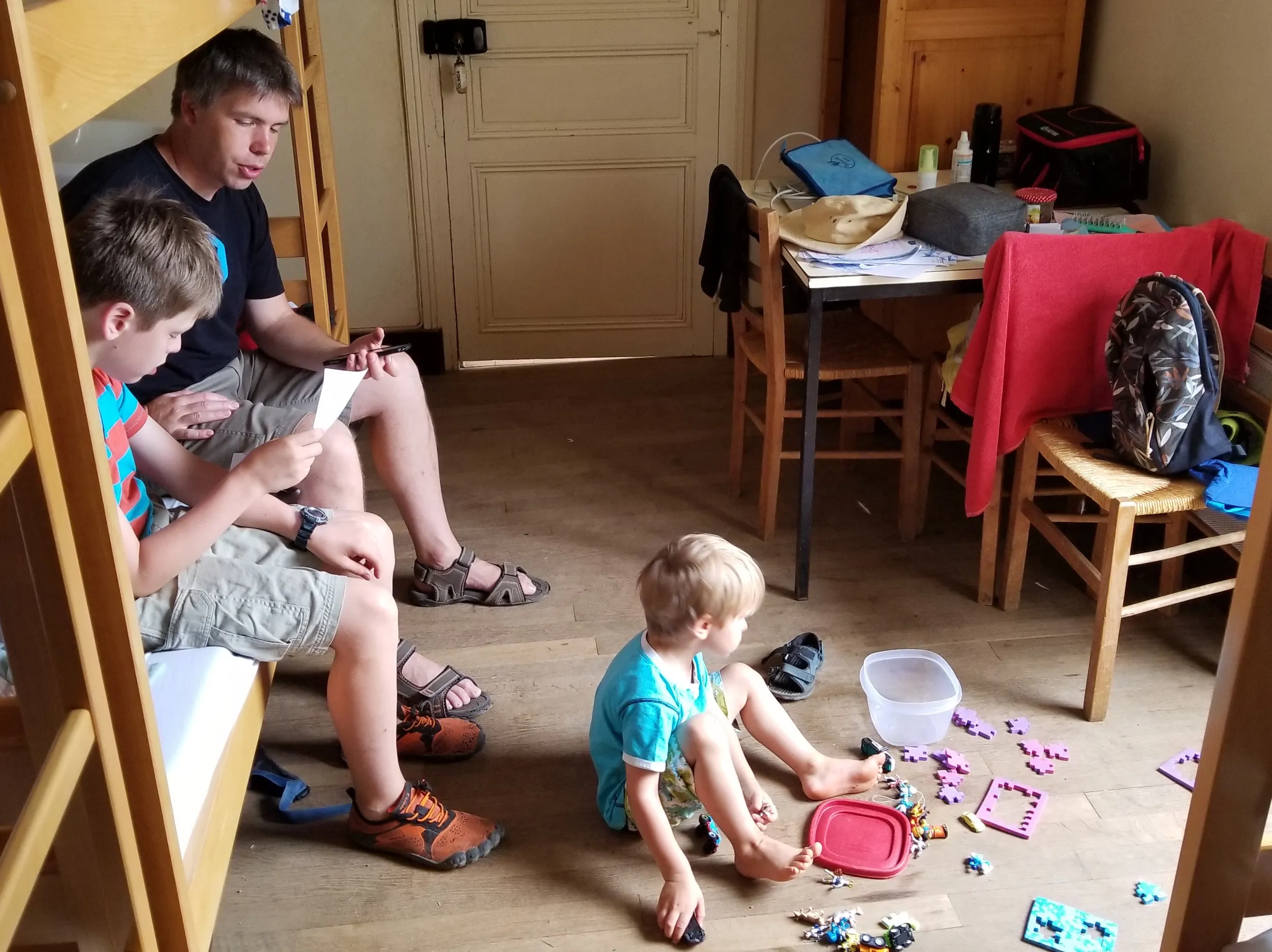 Father and son sitting together, deep in conversation